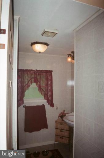 2191 Lewisville Road Summit Point, WV 25446 - Photo 13 of 18 a room with a table and chairs