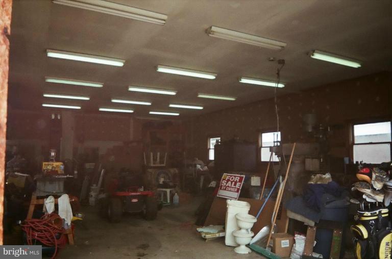 2191 Lewisville Road Summit Point, WV 25446 - Photo 3 of 18 a view of a room with gym equipment