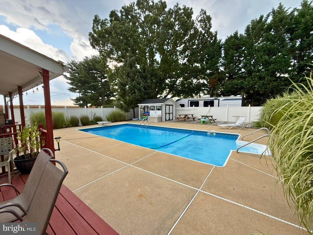 31569 Jim Davis Road Galena, MD 21635 - Photo 16 of 42 a view of a tennis ground with large trees