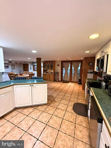a living room with furniture and window