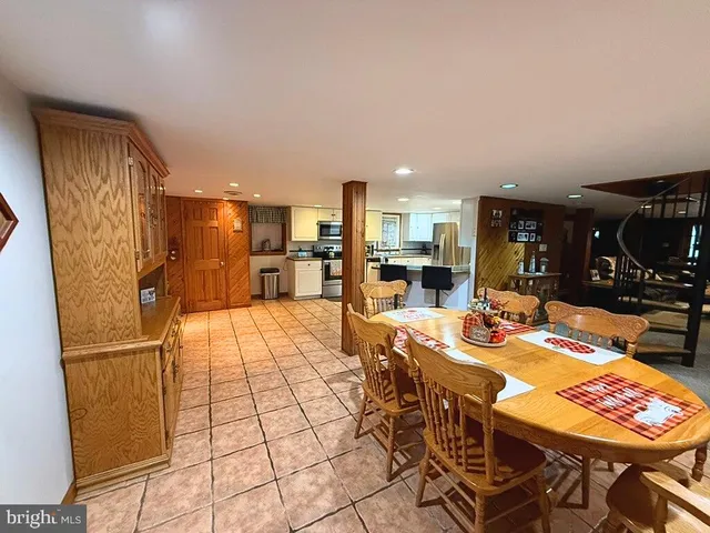 a view of a livingroom with furniture and a fireplace