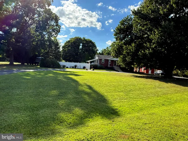 a view of outdoor space and yard