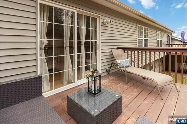 a view of living room and wooden floor