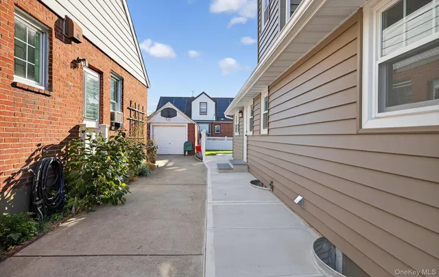 a view of a house with a street