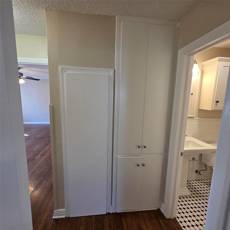 702 Emery Street Denton, TX 76201 - Photo 9 of 16 Built in cabinets in hallway