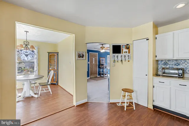 a kitchen with stainless steel appliances a stove sink and refrigerator