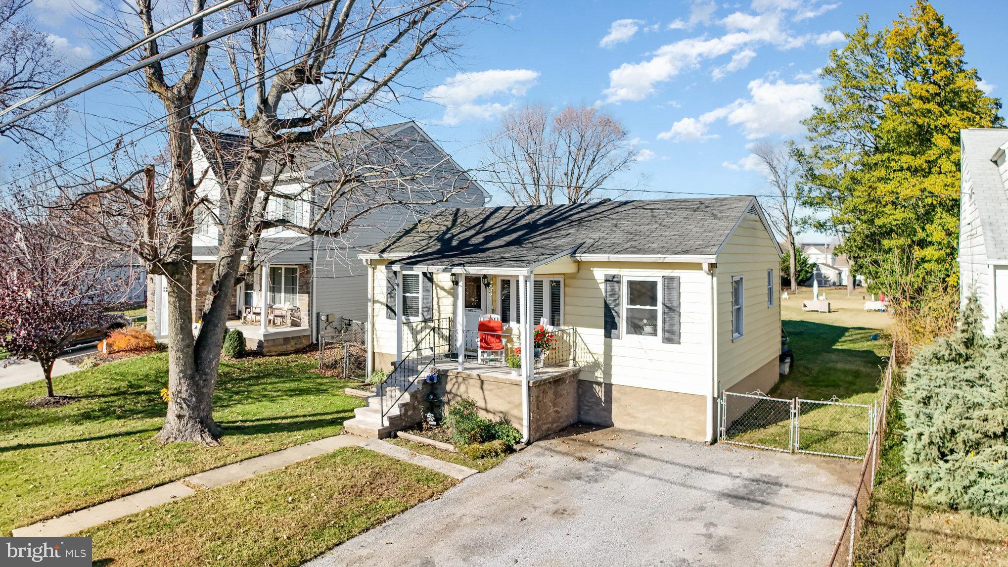 7316 Hughes Avenue Baltimore, MD 21219 - Photo 2 of 43 a view of a house with backyard porch and sitting area