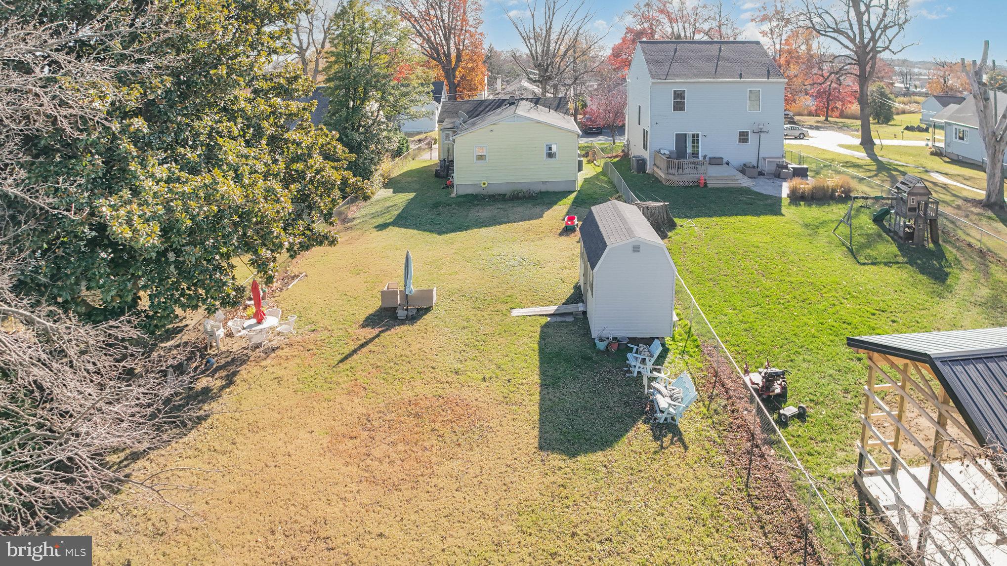 7316 Hughes Avenue Baltimore, MD 21219 - Photo 36 of 43 a view of a house with a yard