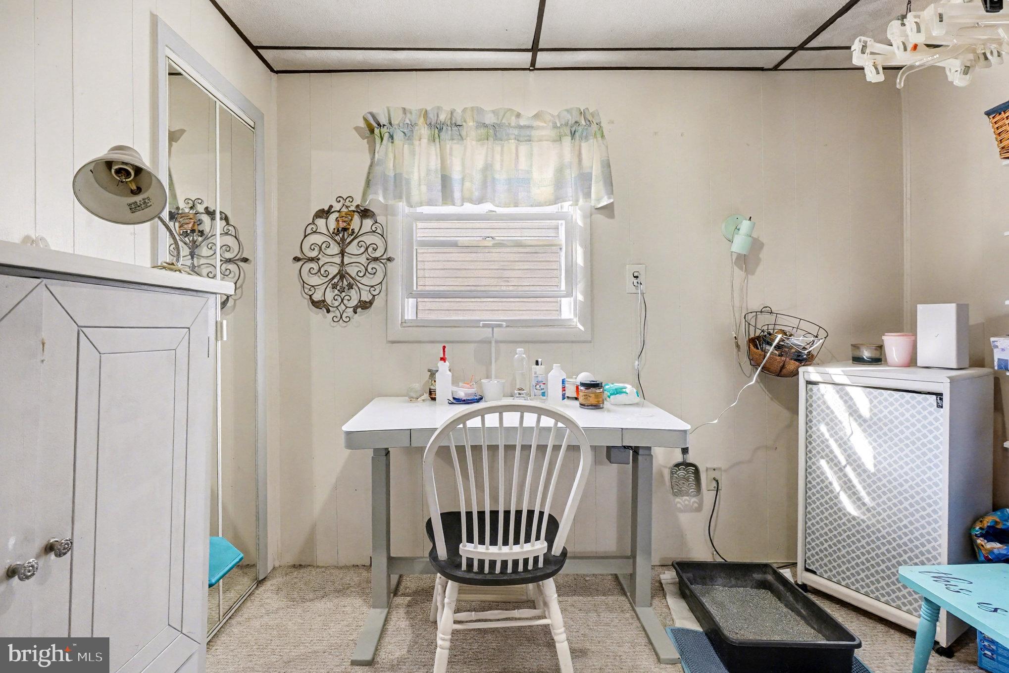 7316 Hughes Avenue Baltimore, MD 21219 - Photo 9 of 43 a view of a dining room with furniture and chandelier