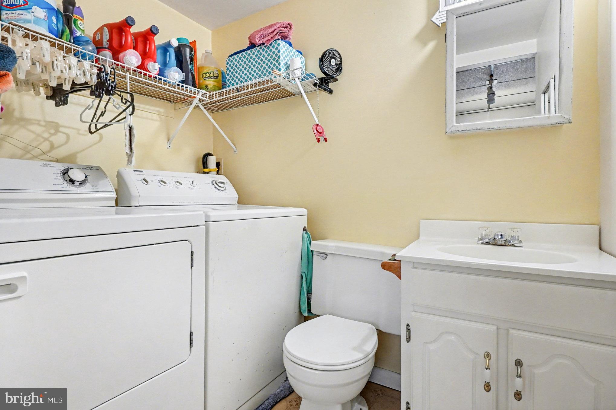 7316 Hughes Avenue Baltimore, MD 21219 - Photo 10 of 43 a utility room with dryer and washer
