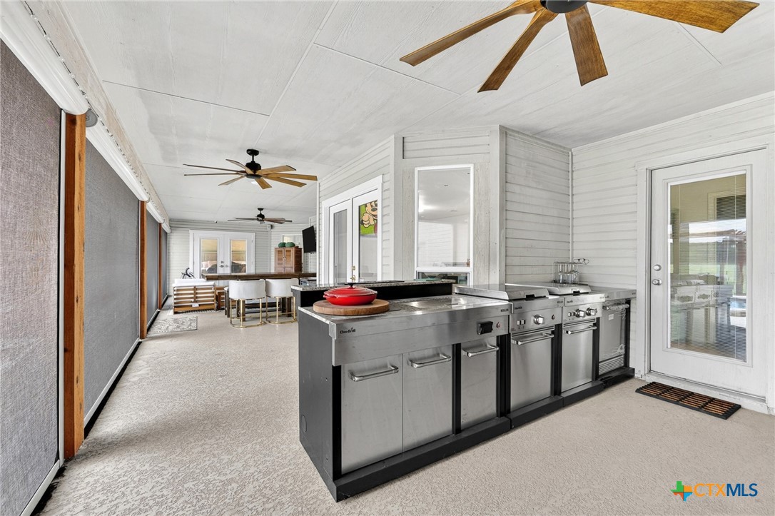 421 Sunset Ridge Drive Killeen, TX 76549 - Photo 41 of 47 a kitchen with a stove and a refrigerator