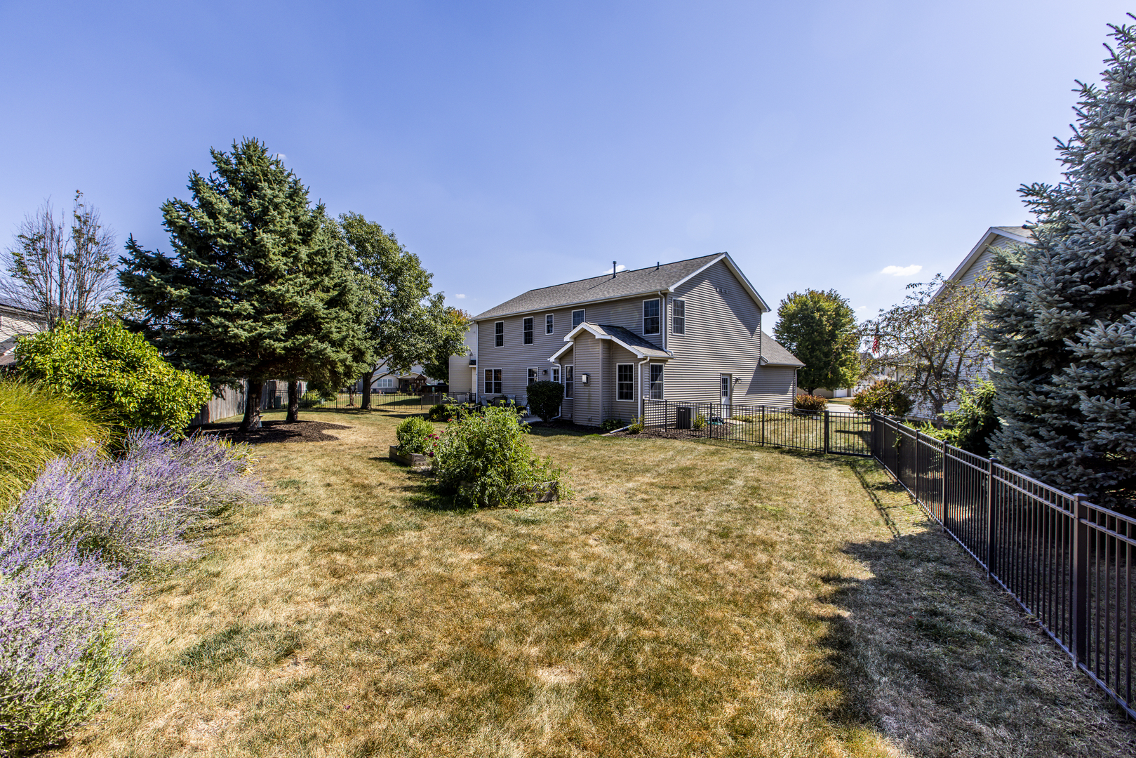 1511 Biltmore Court Normal, IL 61761 - Photo 31 of 35 a view of house with backyard and trees around