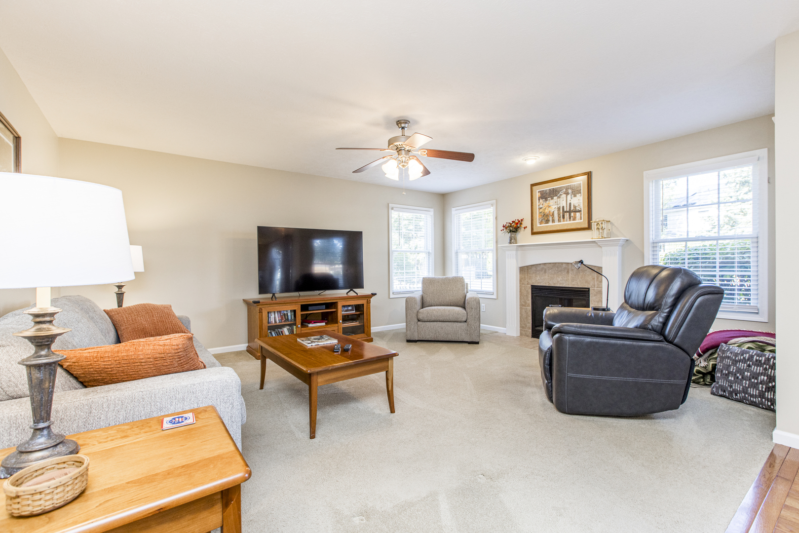 1511 Biltmore Court Normal, IL 61761 - Photo 6 of 35 a living room with furniture a fireplace and a window