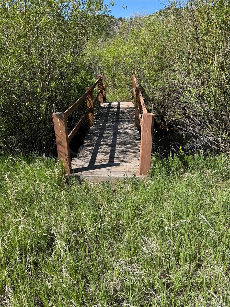 50002 County Rd LL56 Villa Grove, CO 81155 - Photo 12 of 40 a view of a backyard with sitting area