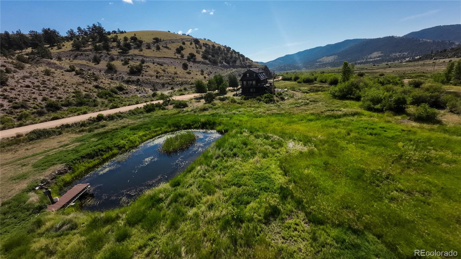 50002 County Rd LL56 Villa Grove, CO 81155 - Photo 3 of 40 a view of a lush green field