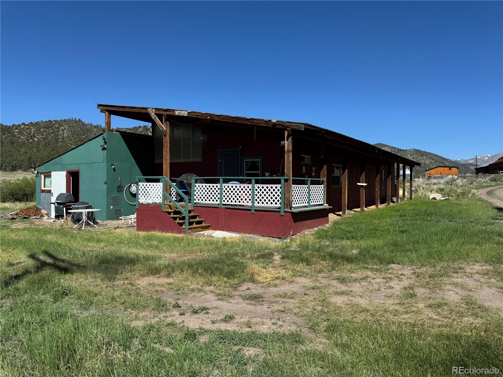 50002 County Rd LL56 Villa Grove, CO 81155 - Photo 31 of 40 a view of a house with backyard and sitting area