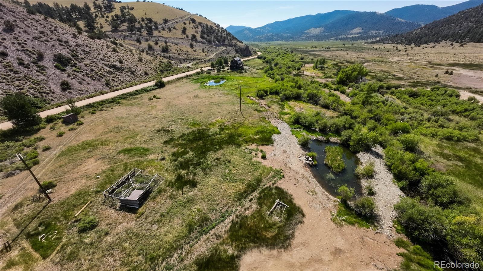 50002 County Rd LL56 Villa Grove, CO 81155 - Photo 38 of 40 a view of a forest with a lake
