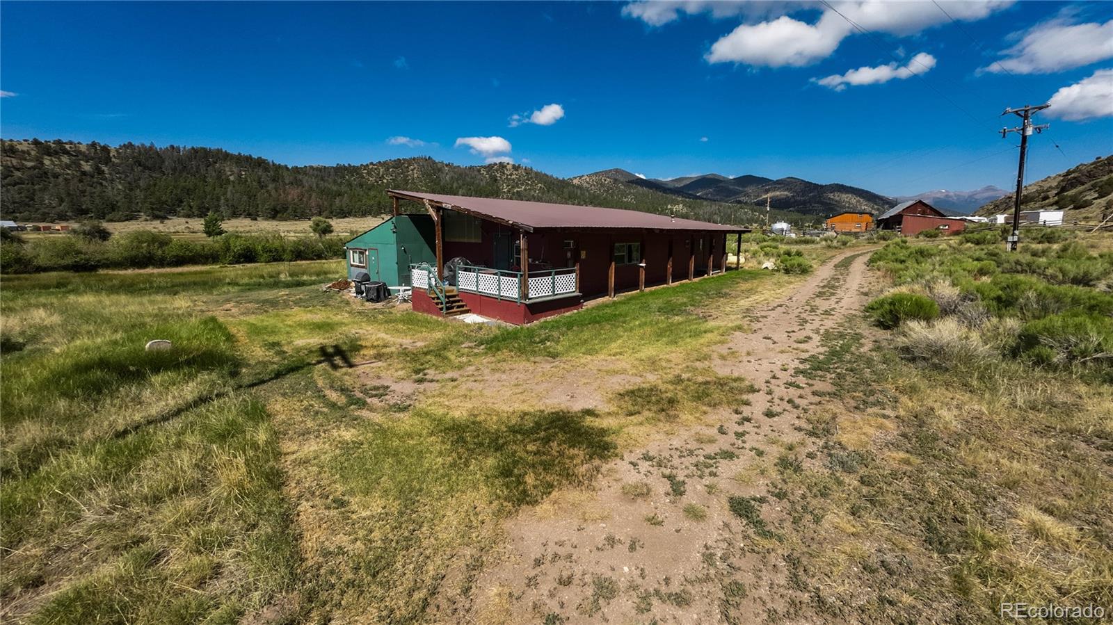 50002 County Rd LL56 Villa Grove, CO 81155 - Photo 6 of 40 a view of a big house with a big yard