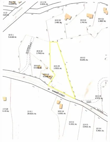 a black and white photo of a bench