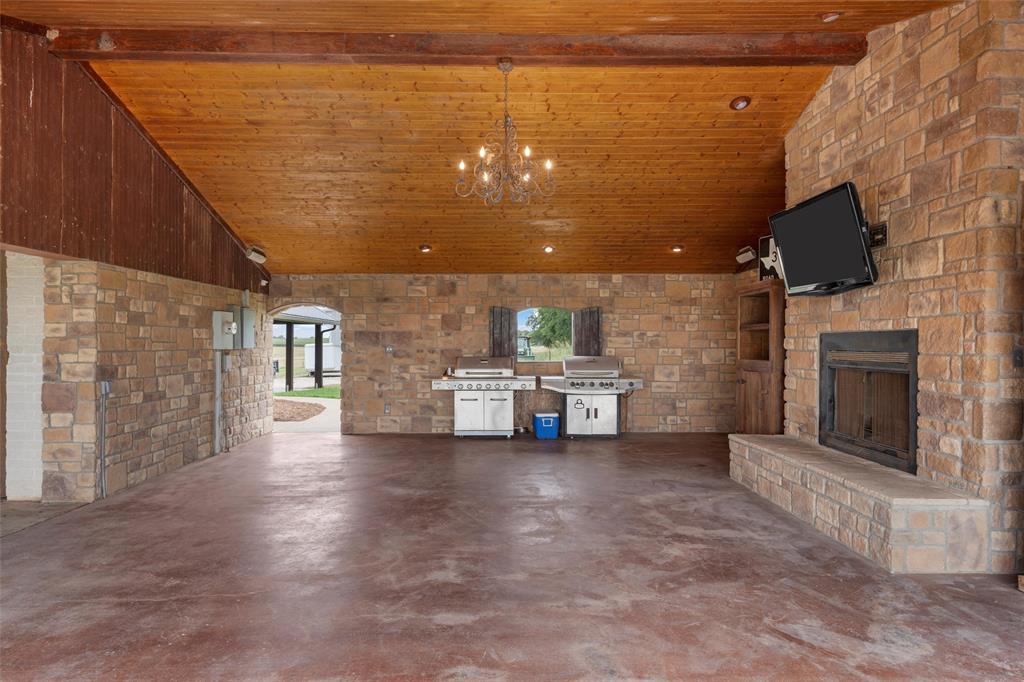3057 Holy Road Abbott, TX 76621 - Photo 9 of 39 a view of a livingroom with furniture and a fireplace