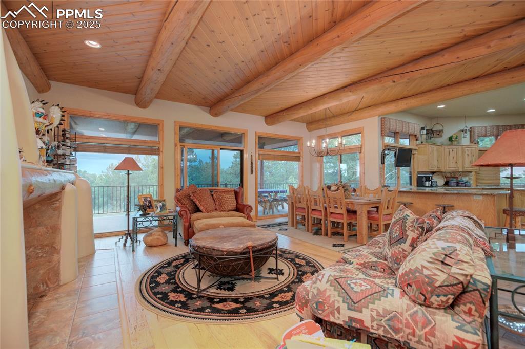 11771 East Smith Road Elbert, CO 80106 - Photo 16 of 35 a living room with furniture and a large window
