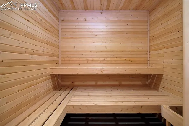 a bedroom with furniture and a fireplace