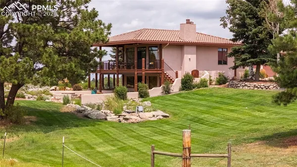 a view of a table and chairs in patio