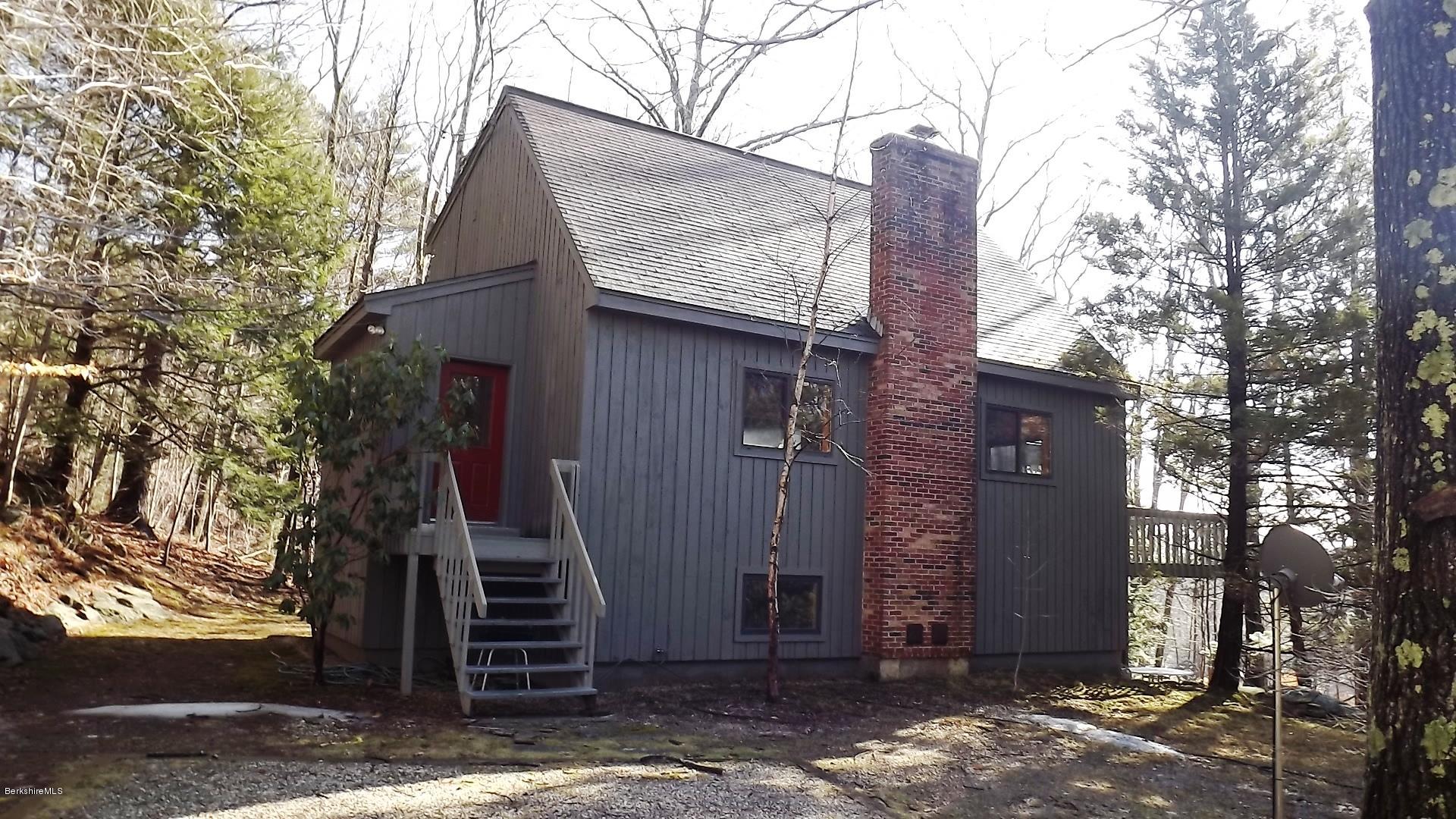 78 Pinnacle Road Otis, MA 01253 - Photo 3 of 25 a front view of a house with a tree