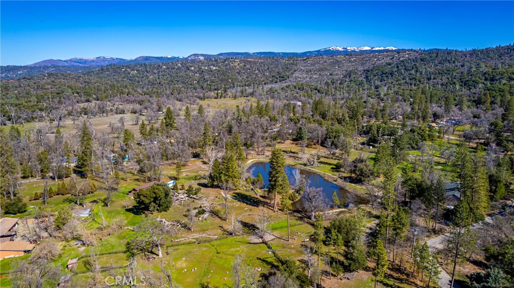 -4.53 Ac Wortham Road Oakhurst, CA 93644 - Photo 18 of 19 a view of a city with mountains in the background