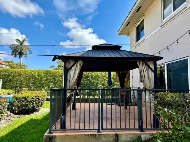 a view of a deck with a yard