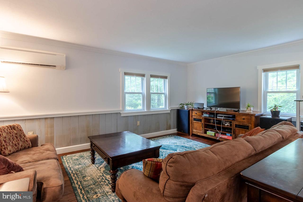 1834 Decker Hollow Road Tyrone, PA 16686 - Photo 20 of 40 a living room with furniture and a flat screen tv