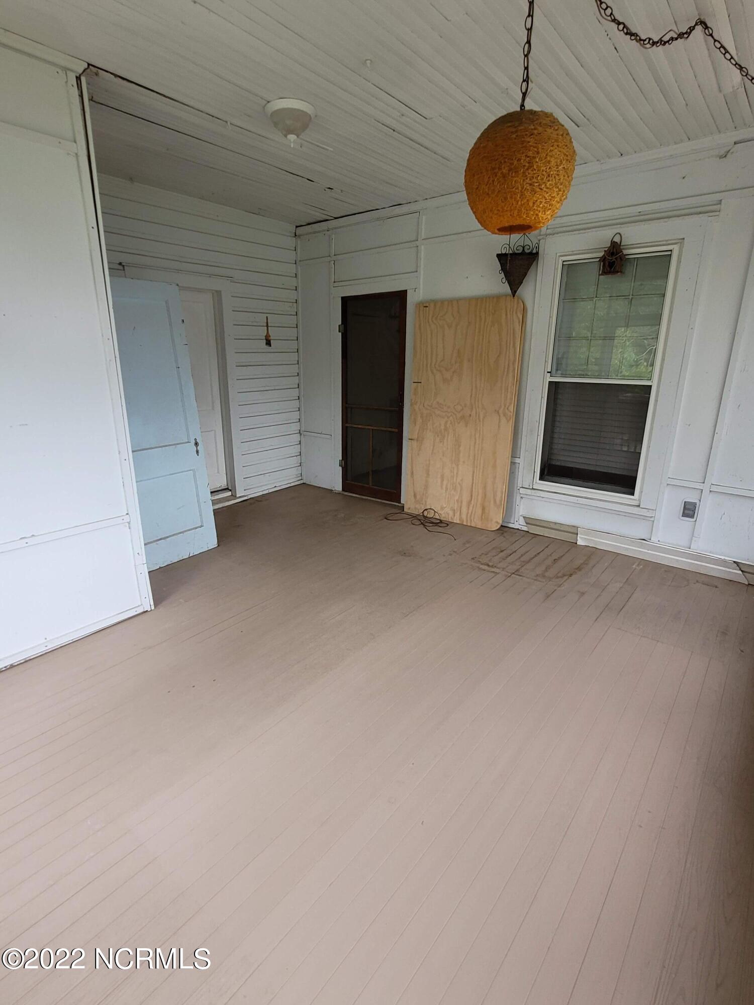 76 2nd Street Vandemere, NC 28587 - Photo 20 of 45 Screen Porch with Trex Decking