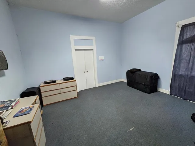 a wooden bench sitting in a room