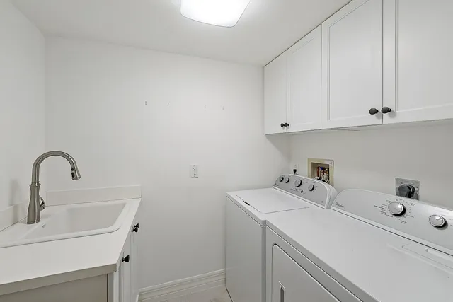 a view of a livingroom with furniture and hardwood floor