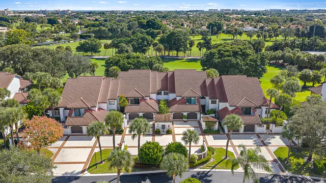 a view of a lake with a building in the background