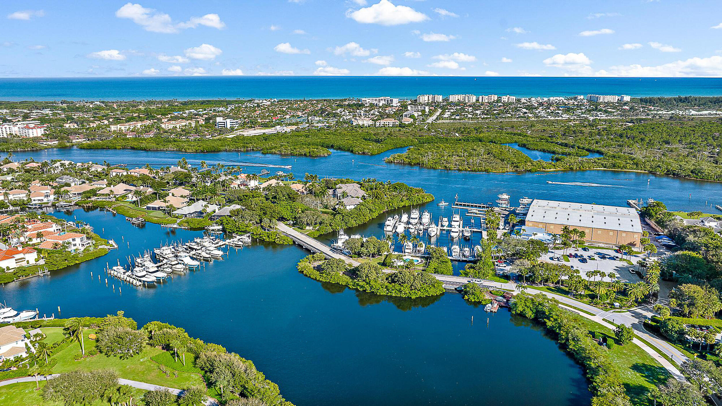 16648 Traders Crossing North, Unit 106 Jupiter, FL 33477 - Photo 30 of 37 a view of a balcony with an ocean view