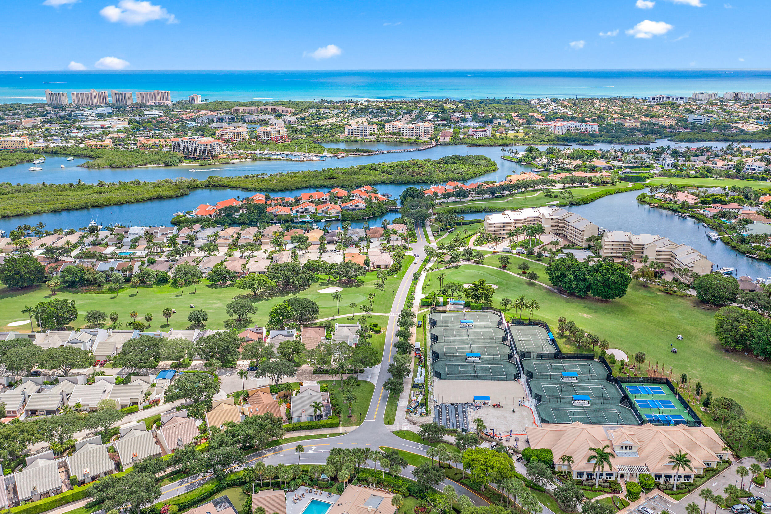 16648 Traders Crossing North, Unit 106 Jupiter, FL 33477 - Photo 36 of 37 an aerial view of residential houses with outdoor space