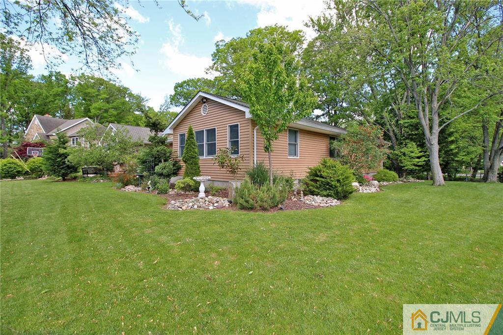 21 Frances Road Edison, NJ 08820 - Photo 12 of 20 a house view with a garden space
