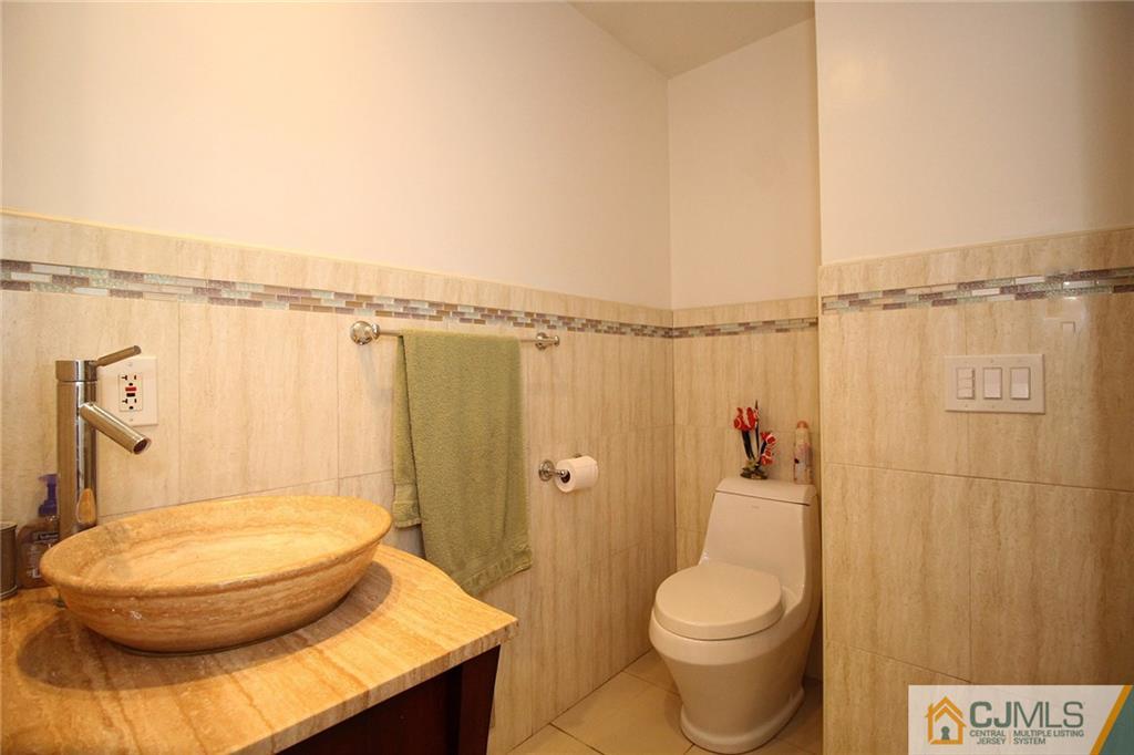 21 Frances Road Edison, NJ 08820 - Photo 14 of 20 a bathroom with a toilet and a shower