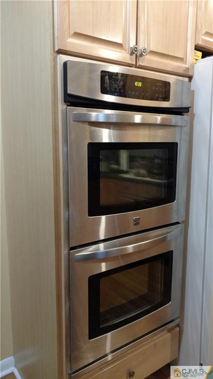 21 Frances Road Edison, NJ 08820 - Photo 19 of 20 a stove top oven sitting inside of a kitchen