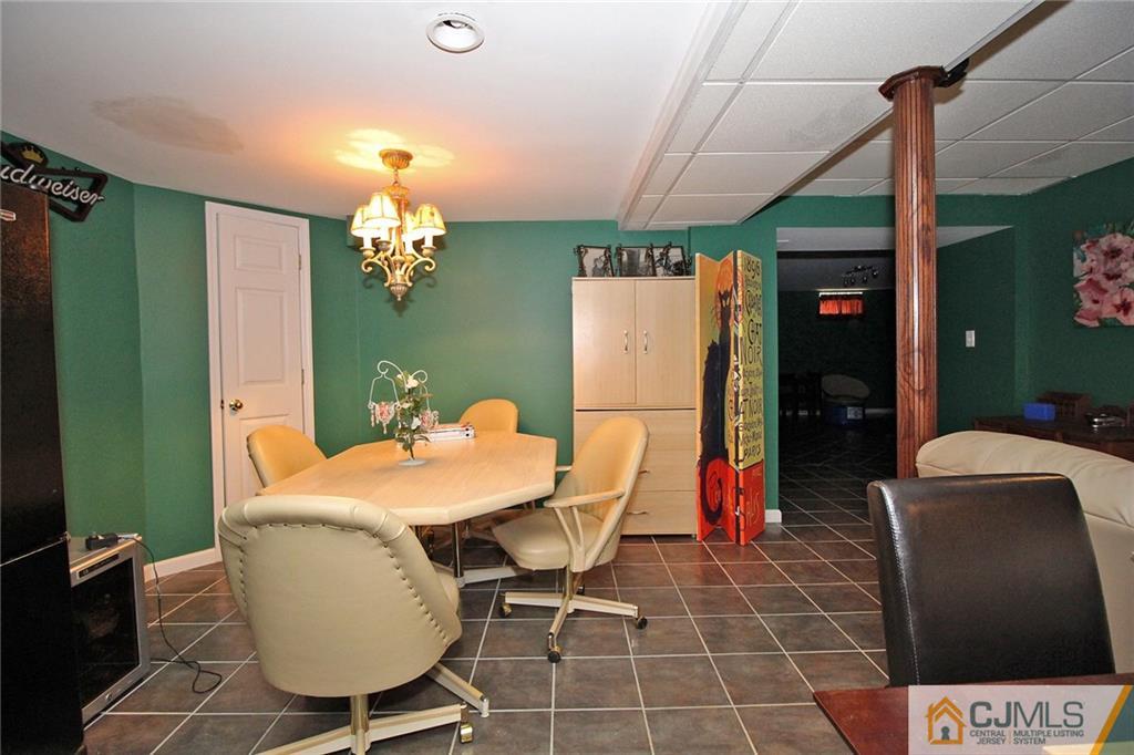 21 Frances Road Edison, NJ 08820 - Photo 10 of 20 a dining room with furniture and chandelier kitchen view