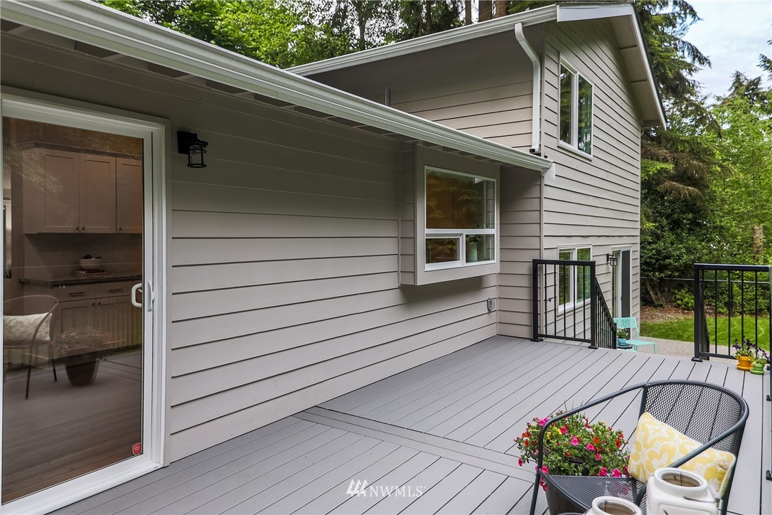 22421 53rd Avenue Southeast Bothell, WA 98021 - Photo 15 of 31 a view of a chair and tables in the balcony
