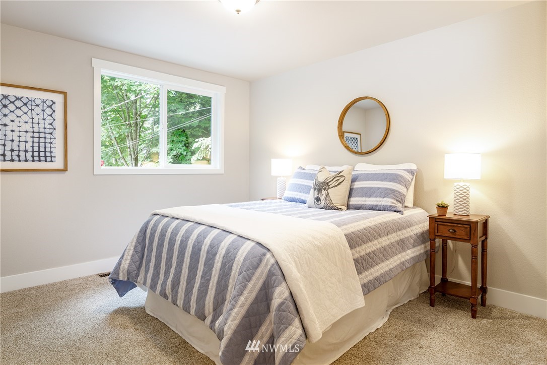22421 53rd Avenue Southeast Bothell, WA 98021 - Photo 19 of 31 a bedroom with a bed and window