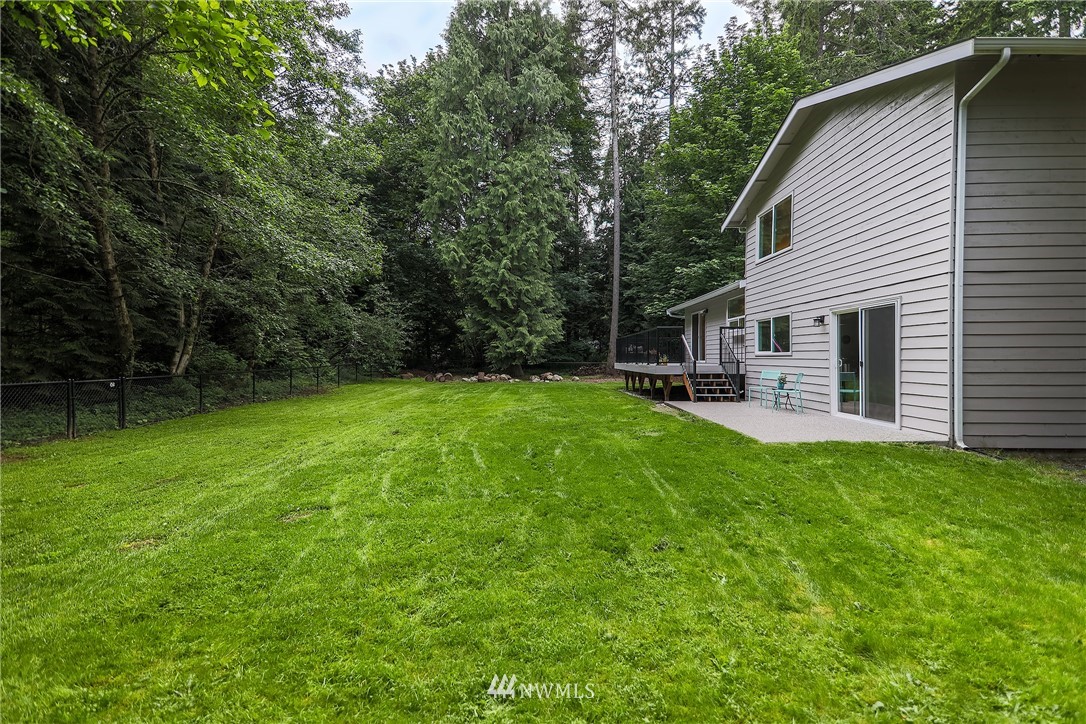 22421 53rd Avenue Southeast Bothell, WA 98021 - Photo 22 of 31 a view of a house with backyard and sitting area