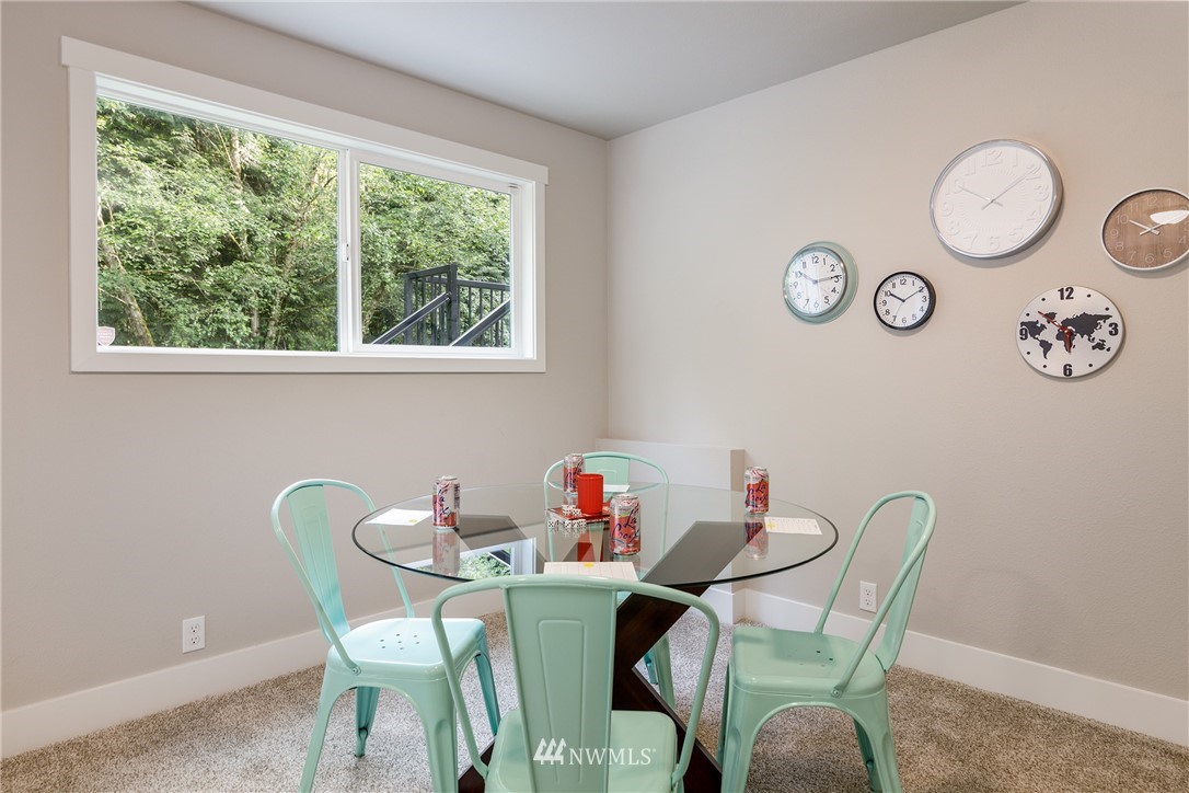 22421 53rd Avenue Southeast Bothell, WA 98021 - Photo 25 of 31 a dining room with furniture and a window