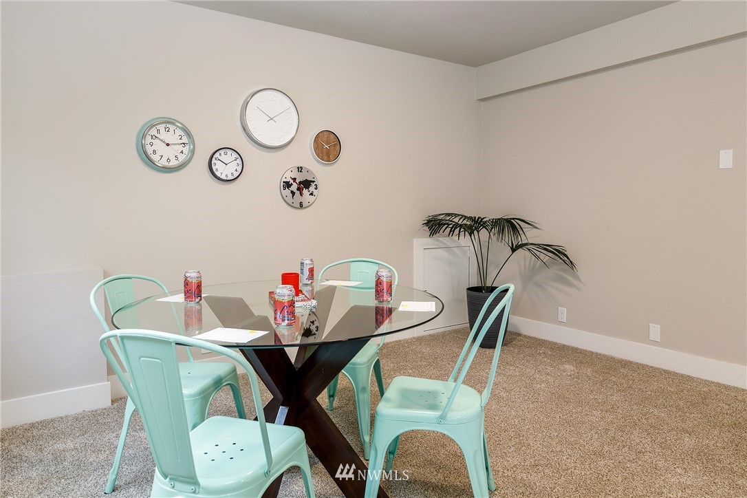 22421 53rd Avenue Southeast Bothell, WA 98021 - Photo 26 of 31 a dining room with furniture and wooden floor