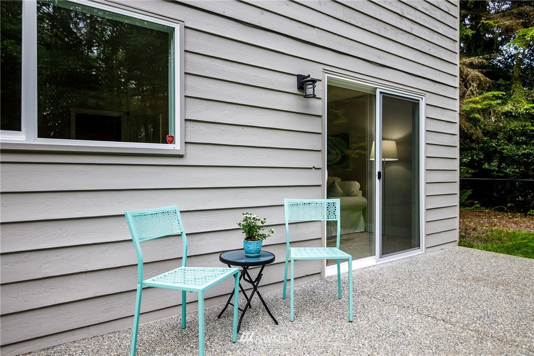 22421 53rd Avenue Southeast Bothell, WA 98021 - Photo 29 of 31 a view of a house with a door and a chair