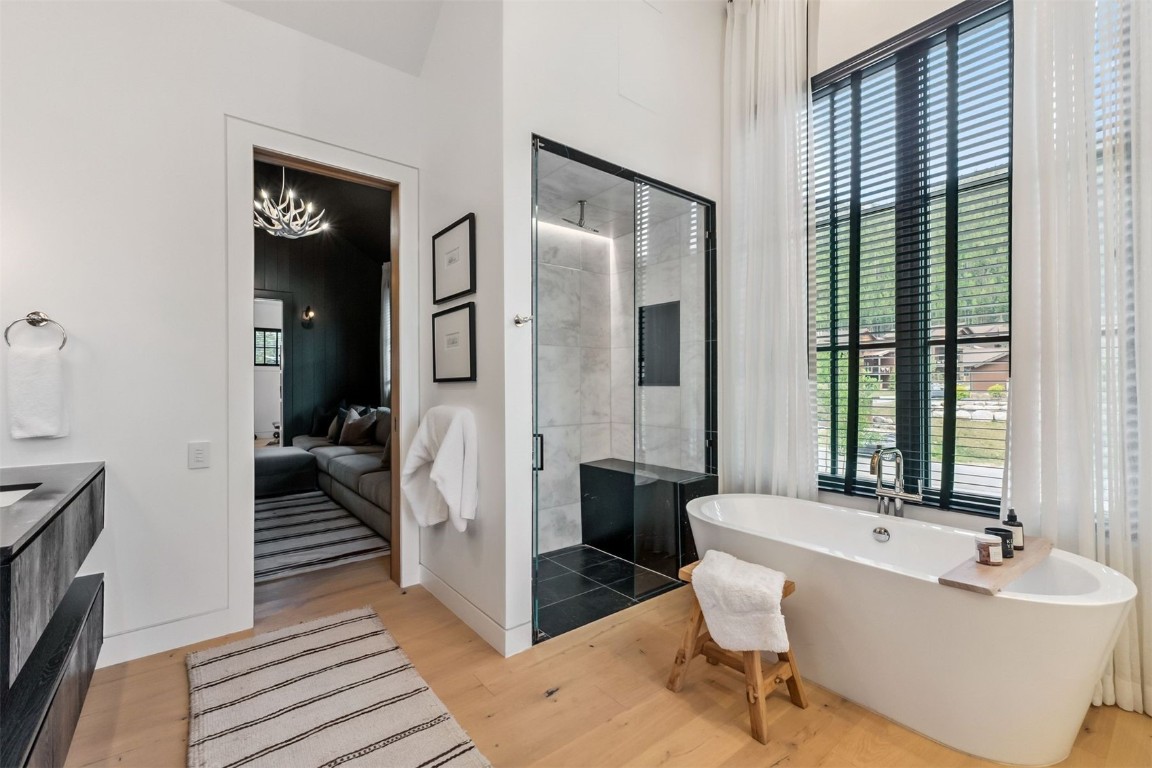 628 Independence Road Keystone, CO 80435 - Photo 19 of 50 a spacious bathroom with a bathtub and a sink