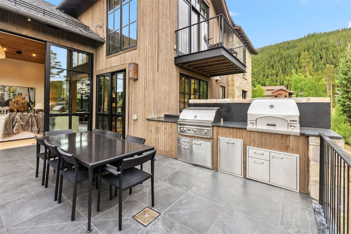 628 Independence Road Keystone, CO 80435 - Photo 7 of 50 a view of a chairs and table in a patio