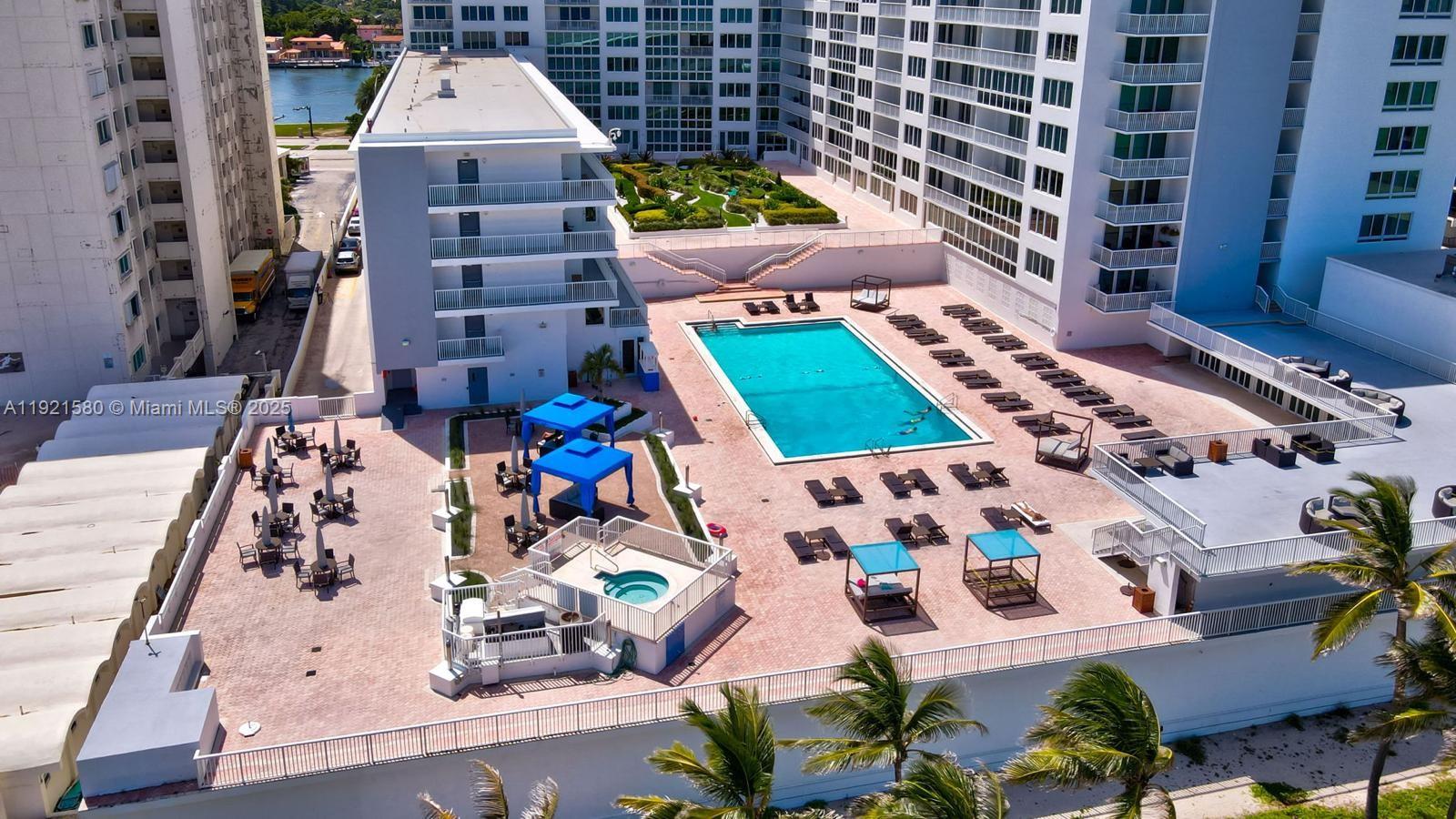 5401 Collins Avenue, Unit 340 Miami Beach, FL 33140 - Photo 11 of 54 Unit located on top floor of the low-rise building to the left of the pool